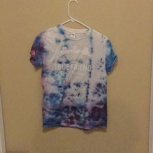 A tie dyed tee shirt from a camp.